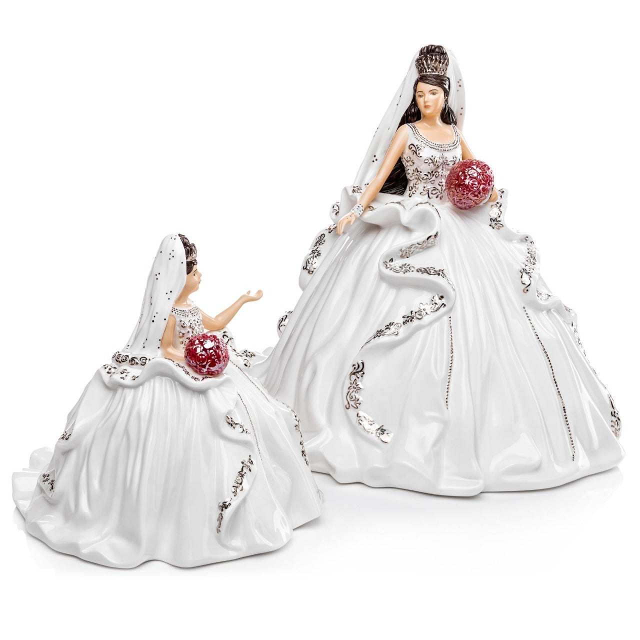 English Ladies Mini Gypsy Affection Brunette  Gypsy Affection is the latest edition to the range and comes in both blonde and brunette and also in mini-figures. This gorgeous figurine stands out from the crowd with stunning gold details throughout the dress and on her beautiful crown.
