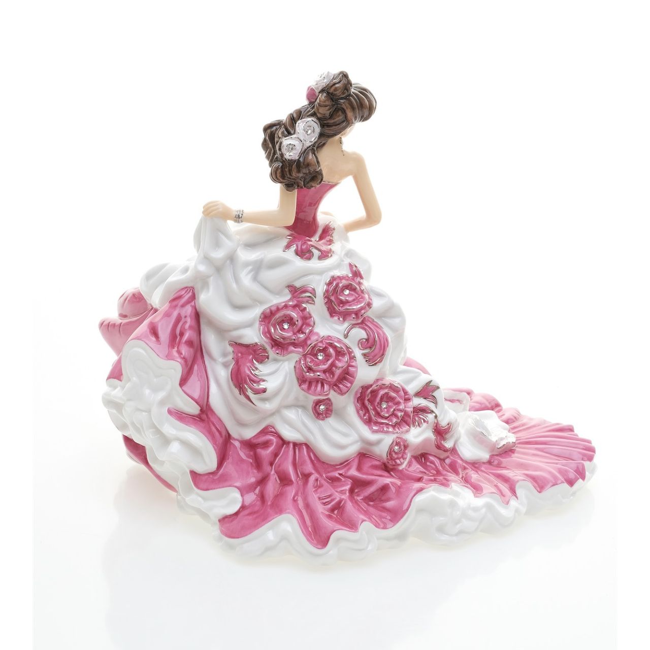 English Ladies Sweet Enchantment  Our fabulous Sweet Enchantment figurine is the latest figure in the English Ladies Co range. Designed and modelled by Valerie Annand, every piece is hand made and decorated and features 24 real Swarowski® crystals. 