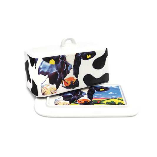 Eoin O'Connor Butter Dish  EOIN O’CONNOR’S eclectic style and striking use of colour makes his work instantly recognisable. While his command over scale and perspective is rooted in his architectural training, his passion remains firmly grounded in creating strikingly vibrant paintings which echo his unique view of Irish life.