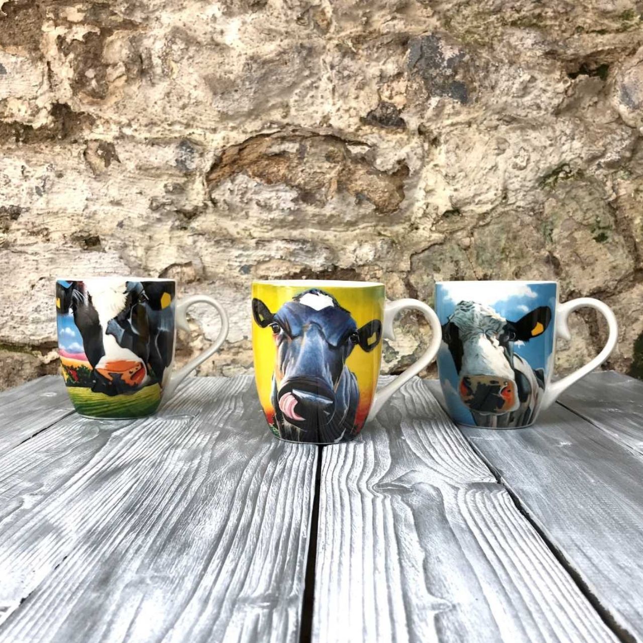 Eoin O'Connor Set of 6 Hatbox Mugs  EOIN O’CONNOR’S eclectic style and striking use of colour makes his work instantly recognisable. While his command over scale and perspective is rooted in his architectural training, his passion remains firmly grounded in creating strikingly vibrant paintings which echo his unique view of Irish life.