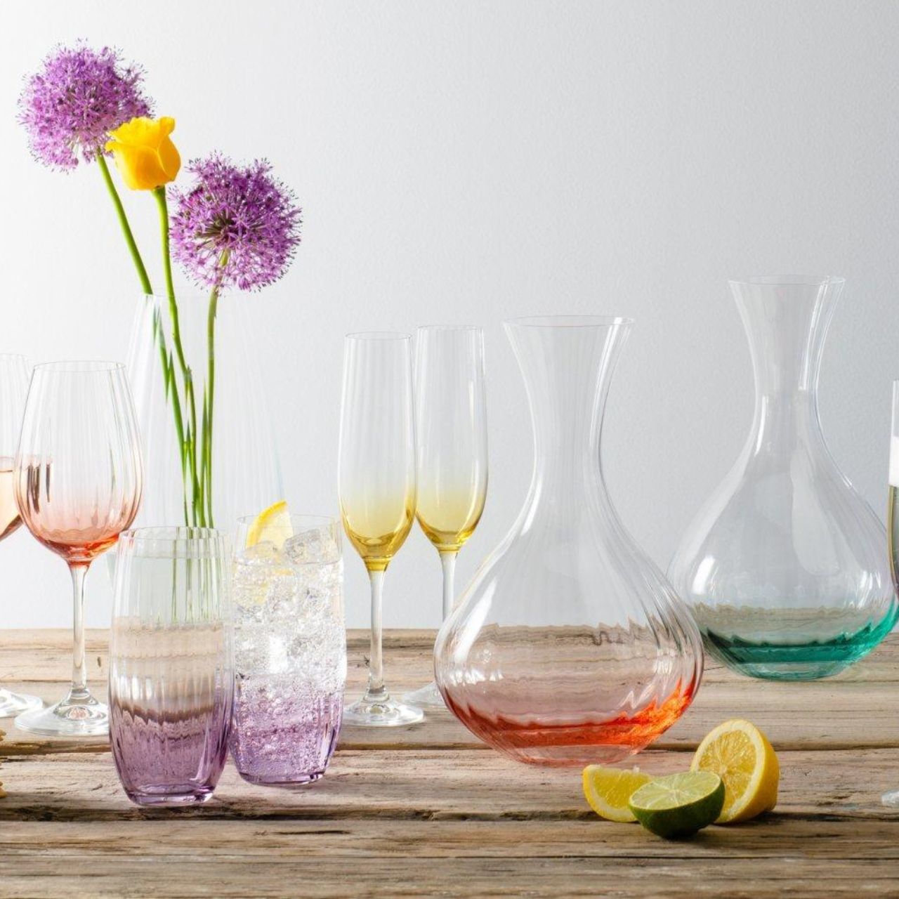 Galway Crystal Erne Carafe Blush  This beautifully crafted Galway Crystal carafe with a blush coloured base is an elegant must have barware piece. The long tapered neck makes the carafe easy to hold and pour and the Erne design has light lines along the body of the carafe adding a stylish finish.