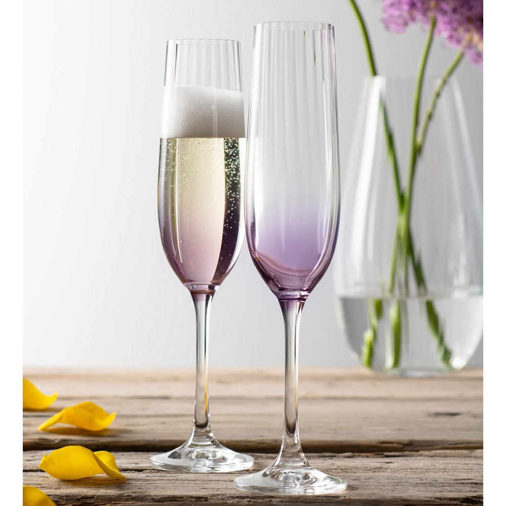 Galway Crystal Erne Champagne Flute Pair Amethyst  These beautifully crafted Galway Crystal flute glasses with a Amethyst coloured base are essential glasses for your home and are designed for Champagne lovers.