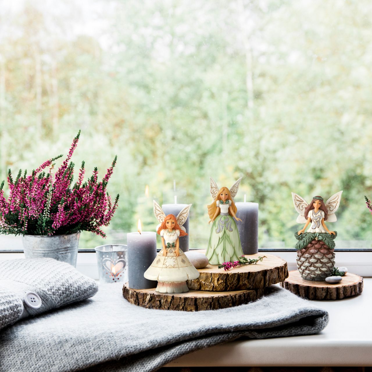 Fairy with Pinecone Skirt Figurine by Jim Shore  Always believe and if not then at the very least enjoy the whimsical beauty of fairy's. This new collection of whimsical woodland fairies brings some magic to the White Woodland Collection and is sure to be a collectors favourite.
