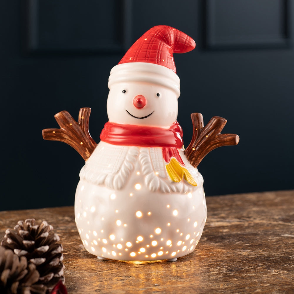 Belleek Living Festive Snowman Luminaire  Belleek Living Luminaire lamps emit a soft warm glow highlighting the delicate surface decoration and piercings, creating beautiful mood lighting for your home.
