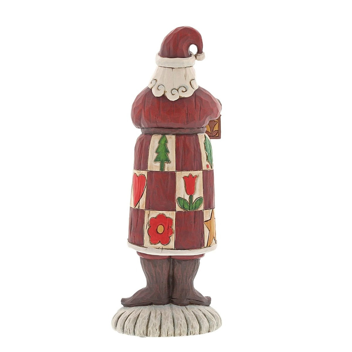 Jim Shore Heartwood Creek Folklore Santa With Lantern  The Folklore collection features Jim Shore's signature colour palette and heartfelt, rustic design. Cloaked in a charming patchwork of quaint holiday symbols, this handcrafted Santa holds a traditional lantern and cheery sprig of holly.