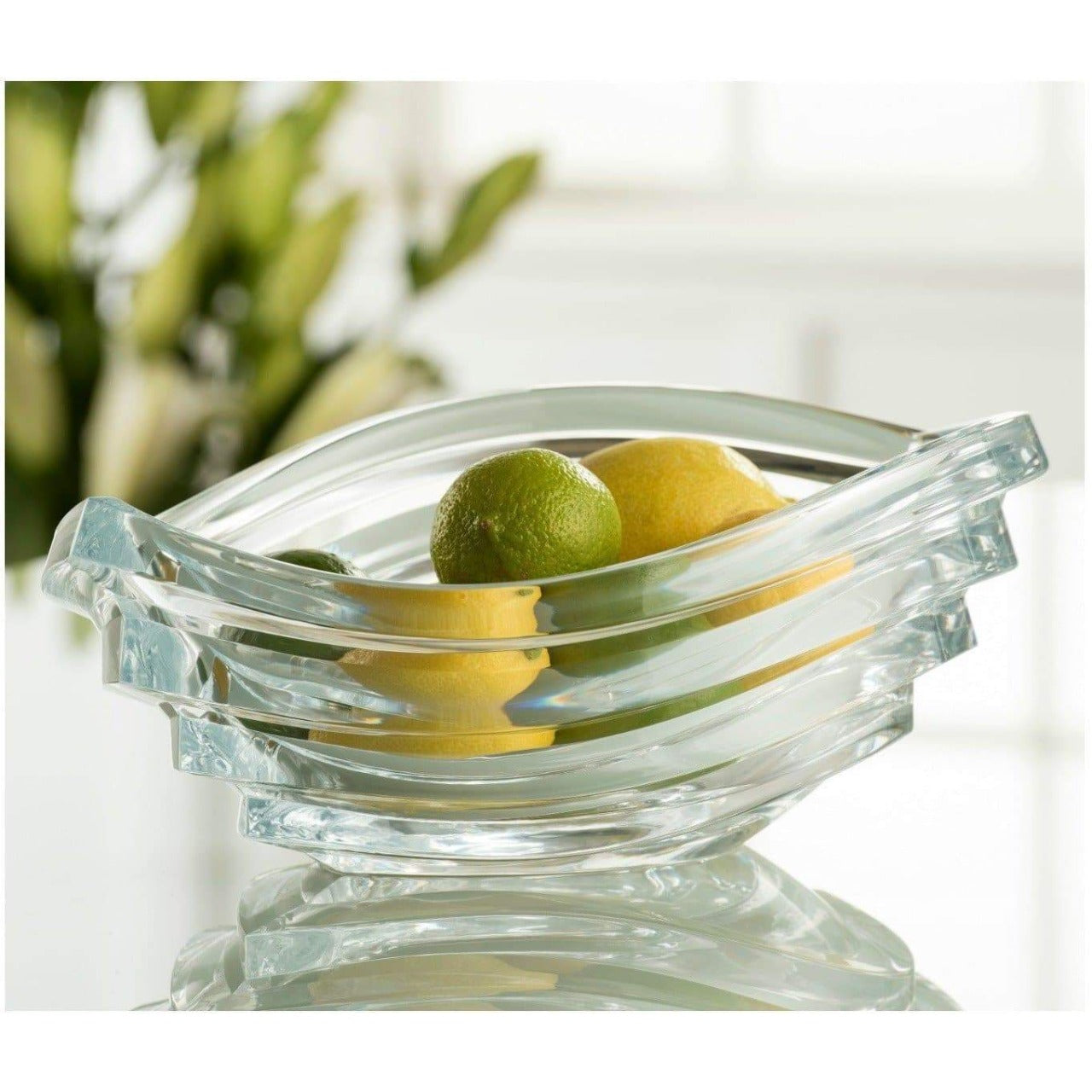Galway Crystal Atlantic Large Bowl  The Atlantic Range has a unique and beautiful design that represents the sharp waves found in the Atlantic Ocean. It captures light and reflections no matter where it is placed. It makes the perfect Homeware Gift either for someone special or for yourself! It can be used a centerpiece or as a fruit bowl.