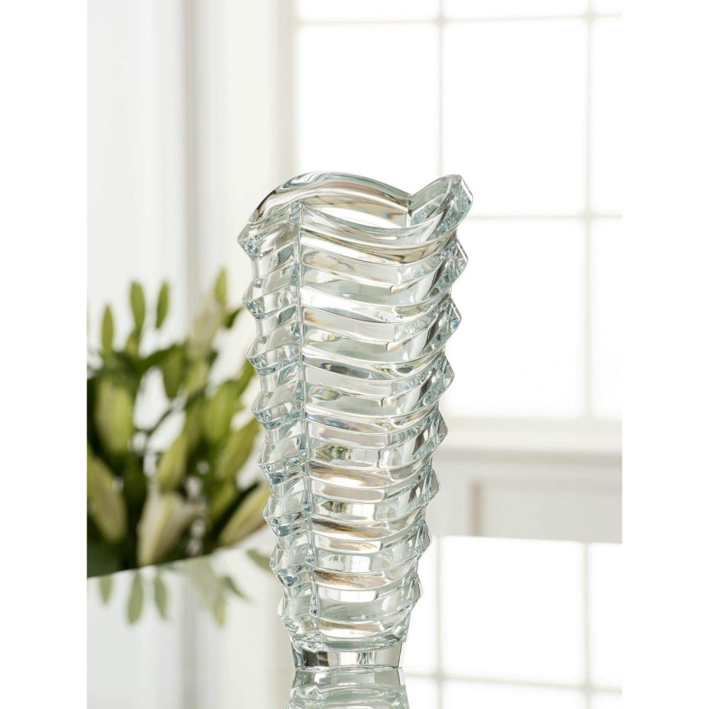 Galway Crystal Atlantic 13" Vase  The Galway Crystal Atlantic 13" Vase can hold a large bouquet of flowers and would beautiful on your dining table. The Atlantic Collection has a unique and beautiful design that represents the sharp waves found in the Atlantic Ocean. 