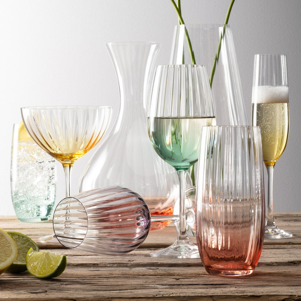 Galway Crystal Erne Champagne Flute Pair Aqua  These beautifully crafted Galway Crystal flute glasses with a Aqua coloured base are essential glasses for your home and are designed for Champagne lovers. The elegant shape of the glass along with the Erne pattern displays light lines along the body adding a stylish and modern finish. 