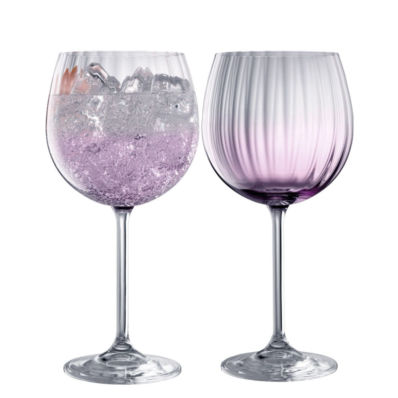 Galway Crystal Erne Gin & Tonic Pair Amethyst  Amethyst colour Gin and Tonic glasses in the Erne suite. Beautiful large balloon gin glasses with elegant lines design in an Amethyst colour. The glass has been designed to add a splash of colour and light design to a stunning gin glass. Ideal for everyday use or as a gift. Another addition to our beautiful Amethyst glassware suite.
