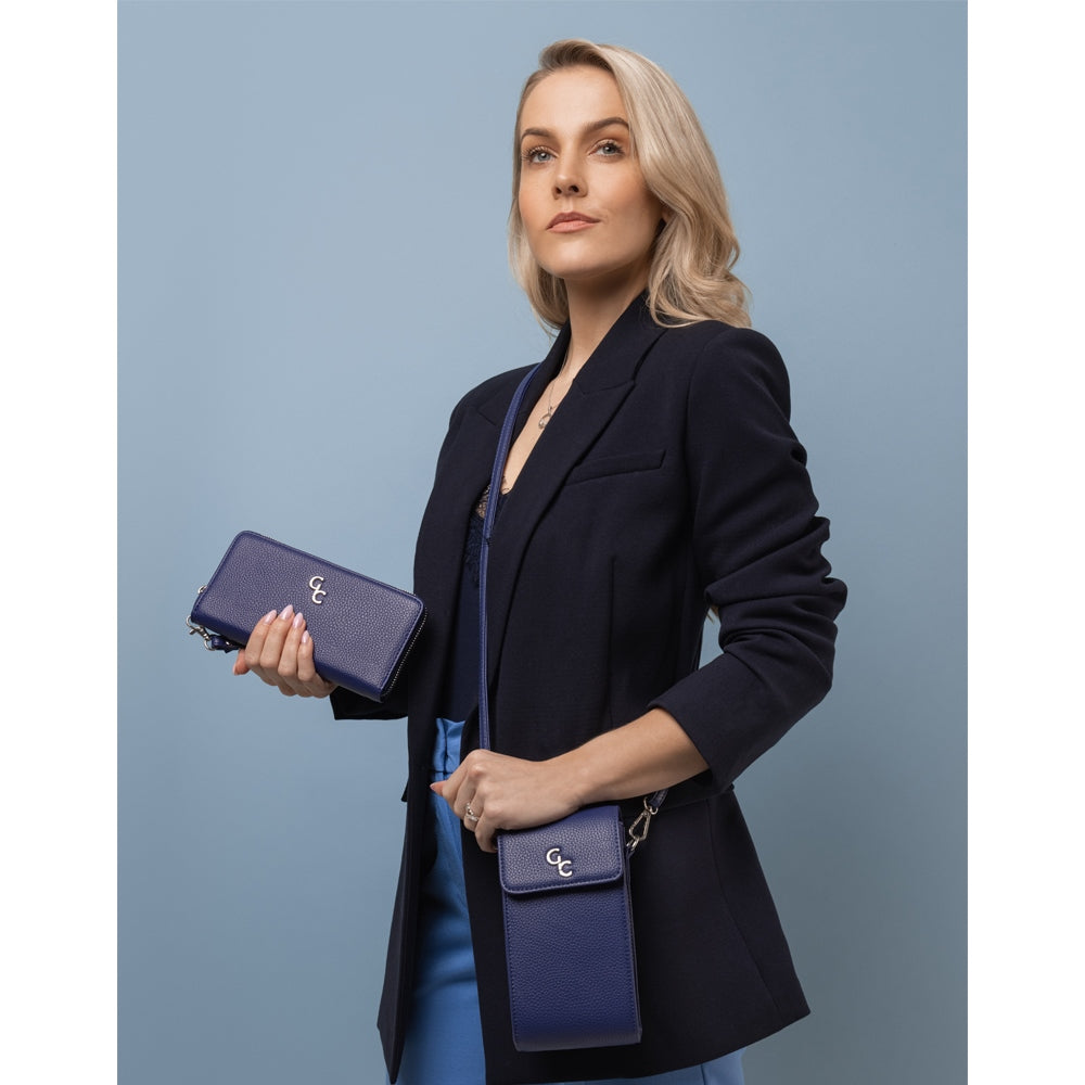 Galway Crystal Fashion Ladies Wallet - Navy  Our Galway Crystal Navy wallet is casual yet classy and perfect for carrying lifes little essentials. Use this elegant wallet to safely store cash, cards and more within a zip closure.