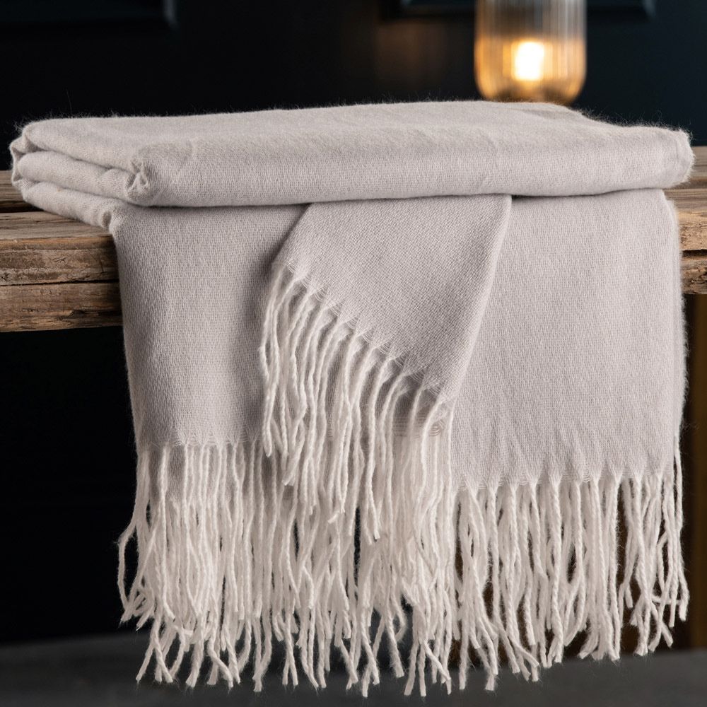 Galway Crystal Pearl Grey Throw 150 x 190 cm  Our super soft Perl Grey Throw will make any house a home. This simple but elegant throw is the perfect addition to any bedroom or living space. It's soft texture provides a snug and comforting layer adding that cosy element to your home all year round.