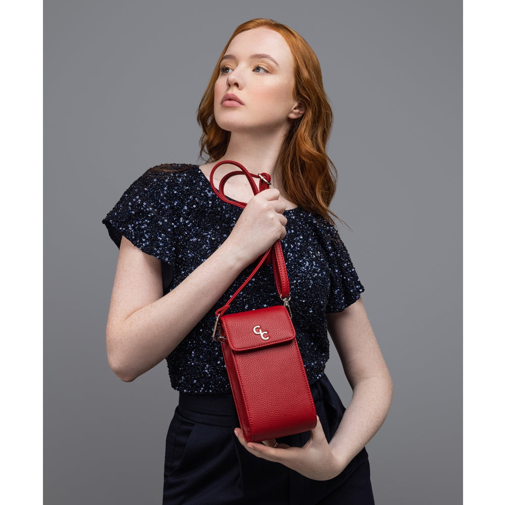 Galway Crystal Fashion Mini Crossbody Handbag - Red  Introducing the new must have accessory that is truly functional. Our Lightweight, Slim, Sleek, Crossbody bag is designed to hold the most essential accessory: Your mobile phone.