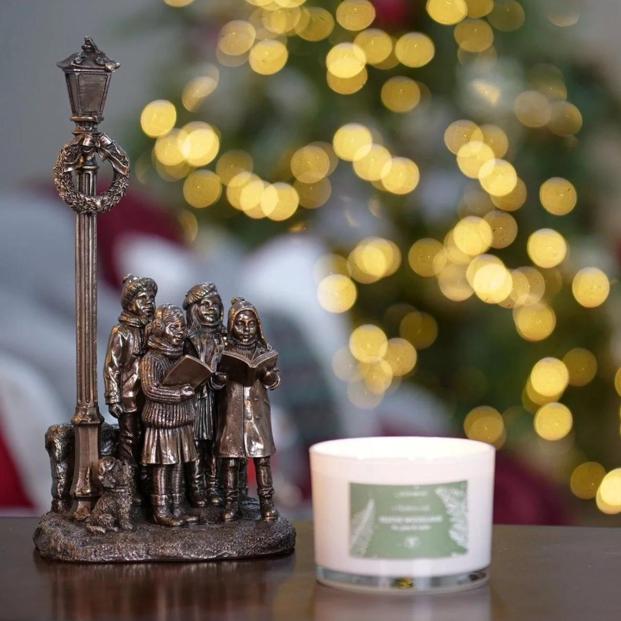 Genesis Ireland Christmas Carol Singers  A stunning ornament that is sure to bring festive cheer to your home. A beautiful bronze coloured Christmas decoration, by Genesis Ireland. Depicting a group of carol singers spreading the joy of Christmas. Let the magic of Christmas fill your home with this gorgeous sculpture for many years to come.