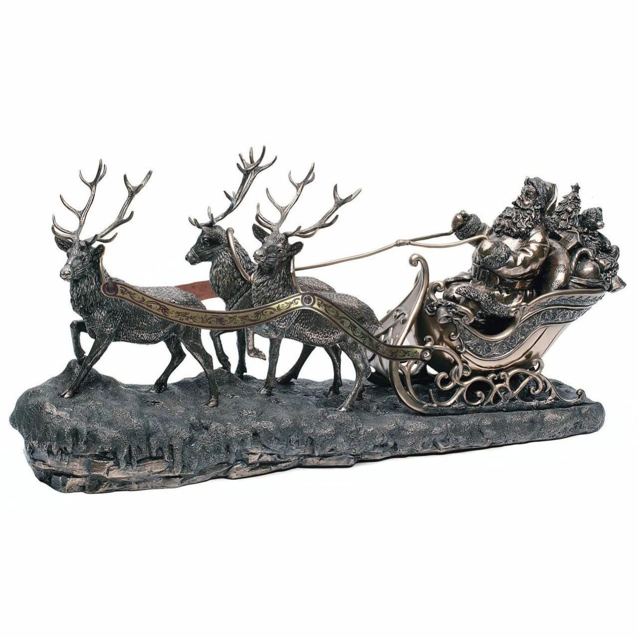 Genesis Santa on Sleigh  Beautifully crafted from cast bronze and handcrafted, this Santa on Sleigh sculpture will make a beautiful addition to your home during the holidays. Intricately detailed, this Santa Claus features three reindeer's pulling his sleigh.