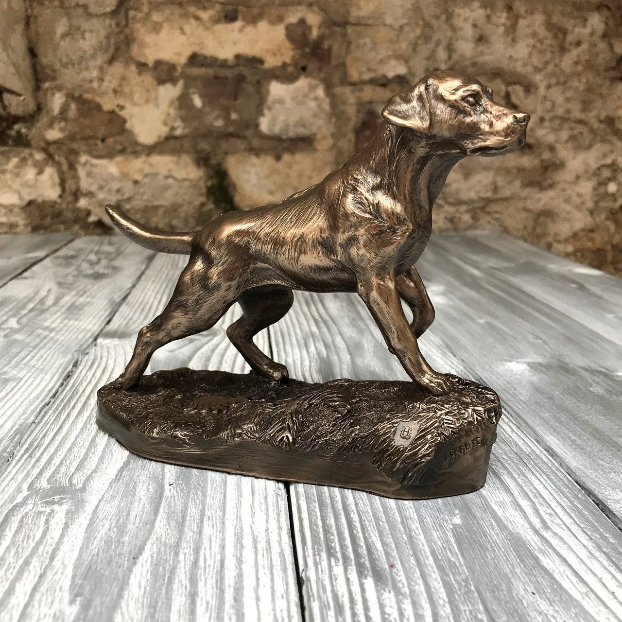 Genesis Labrador  A beautiful piece of bronze sculpture depicting a Labrador.  Genesis Fine Arts has evolved into a much loved and world famous Irish brand to produce a striking range of handcrafted cold cast bronze sculptures.
