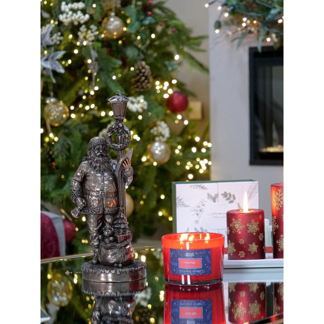 Genesis Ireland Santa's Check List  A stunning ornament that is sure to bring festive cheer to your home, beautiful bronze coloured Christmas decoration, by Genesis Ireland.  Depicting Santa Claus checking his list before setting of on Christmas Eve. Have you been Naughty or Nice? Let the magic of Christmas fill your home with this gorgeous sculpture for many years to come.