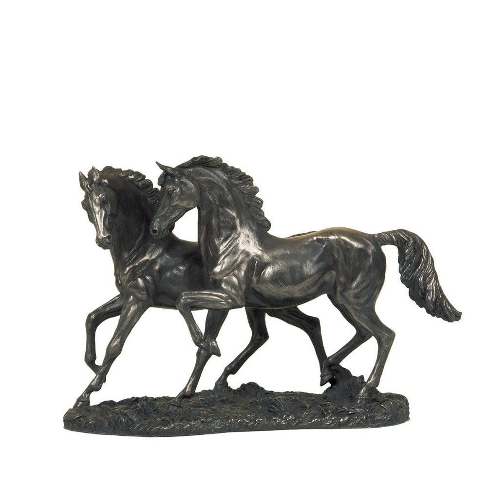 Genesis The Chase  Entitled 'The Chase', this is a fine centerpiece for those fond of horses. Made from cold cast bronze and hand finished to perfection. Fully felted on the bottom to protect surfaces. A wonderful ornamental horse sculpture for the home.