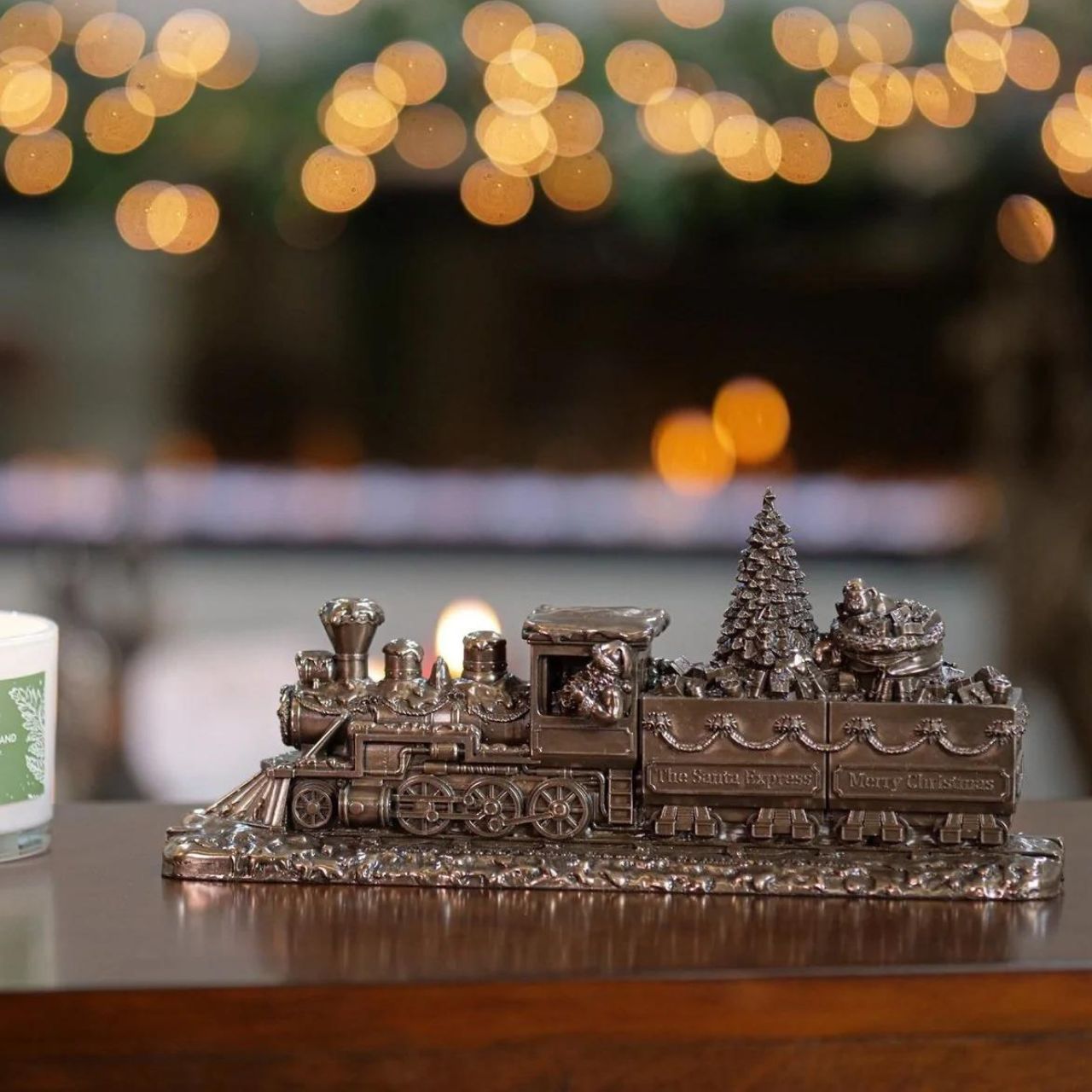 Genesis Ireland The Santa Express Train   A stunning ornament that is sure to bring festive cheer to your home, beautiful bronze coloured Christmas decoration, by Genesis Ireland.  Depicting Santa Claus on his way to delivery all the presents on Christmas Eve. Let the magic of Christmas fill your home with this gorgeous sculpture of The Santa Express.