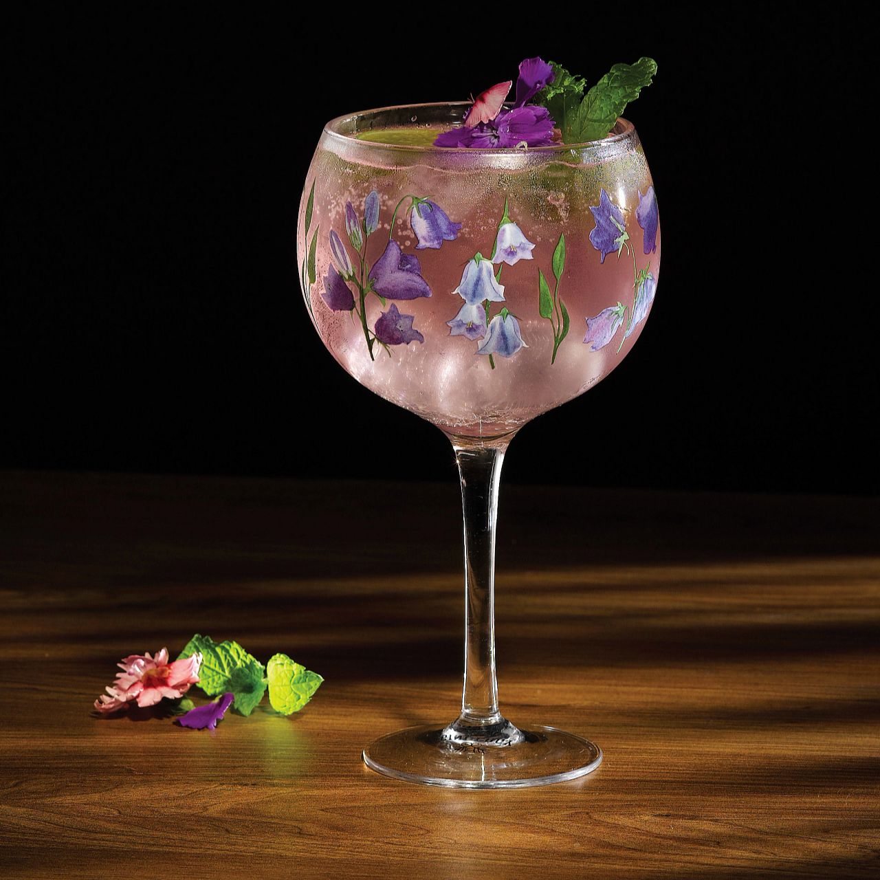 Ginology Bluebell Copa Gin Glass  Beautiful in blue, this Bluebell Gin glass is perfect for your garden parties. We recommend pairing our Bluebell glass with a premium Gin and a floral tonic Garnish with pretty blue flowers to make your drink look even cuter.