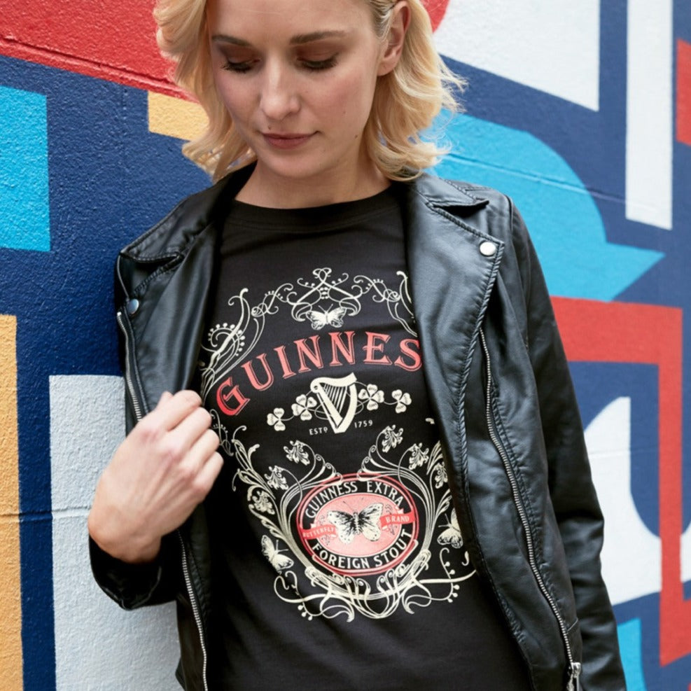 Guinness Black Butterfly Ladies T-Shirt - XX-Large  This vintage style shirt features an ornate frame of butterflies and shamrocks. This is a classic fit ladies shirt for comfort and style. This black ladies T-shirt is part of the Guinness Official Merchandise Collection.