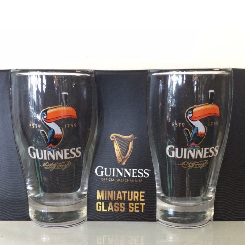 Guinness Mini Toucan Pint Glass Shot Glass Size  Packaged in a branded Guinness gift box, mini pint glasses in shot glass size feature the Guinness Toucan as well as the Arthur Guinness signature.