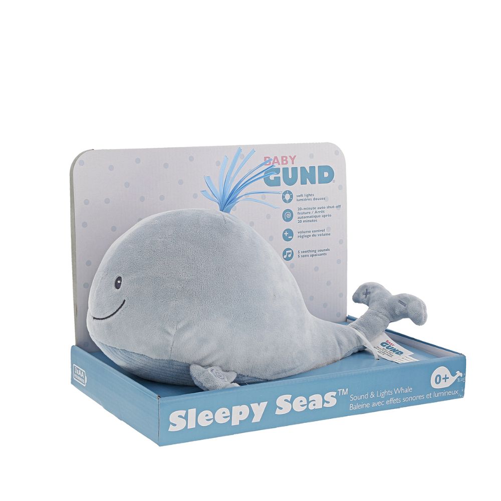 GUND Baby Sleepy Seas Light & Sound Whale  This musical plush toy will help your babies drift off to sleep. The whale is presented in an oh-so-soft light blue fabric, with blue ribbons for its hair, and dark embroidery creating a smiling face. Press the left fin and the animated whale splashes into life. Press the musical note on its right fin and the plush starts to play one of five different noises: Ocean Magic, Soothing Ocean Whale Sounds, Brahms' Lullaby, Bubbles or Ocean White Noise.