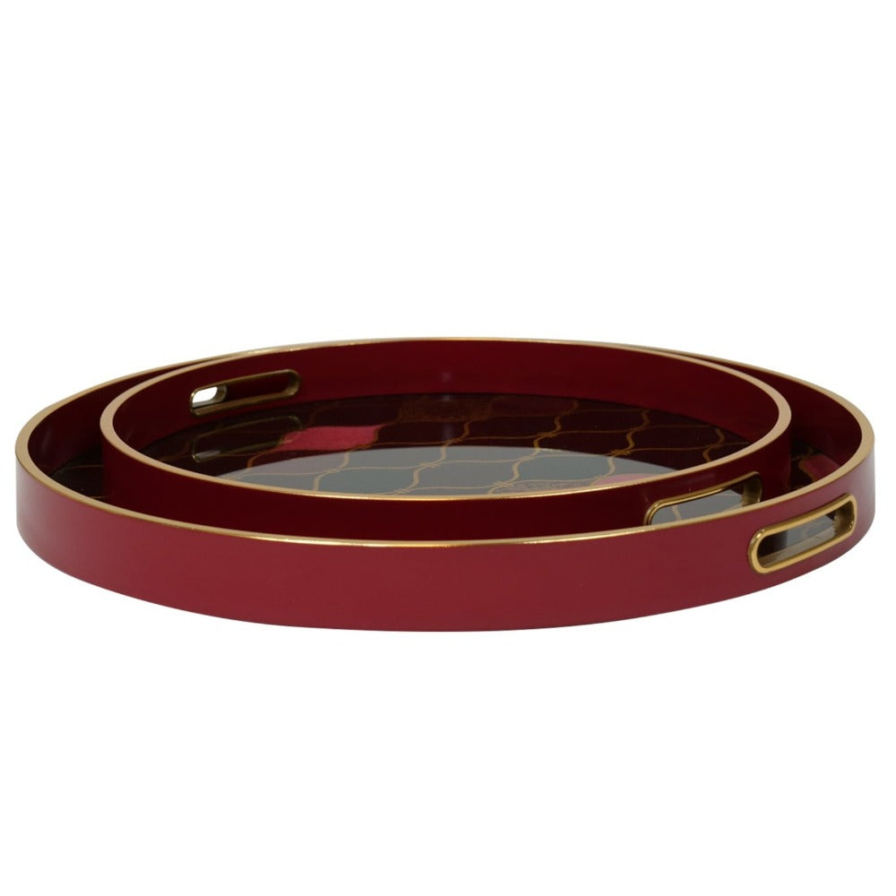 Mindy Brownes Haralson Trays Set of 2  A stunning set of two circular trays, with a rich red surround, gold rim and black interior, finished with a gold pattern and pops of pink and rich red colours.