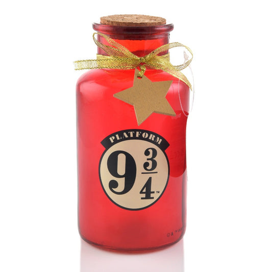 Harry Potter LED Light Up Jar Platform 9 3/4  Lumos maxima! Light up your home this Christmas with this LED glass jar light. With a glitter design, this fun accessory is sure to kick off your magical journey to Hogwarts.