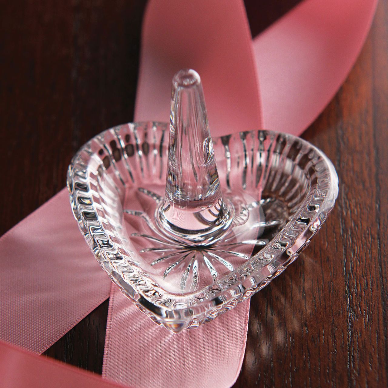Waterford Crystal Heart Ring Holder  Keep precious jewelry close to your heart. Radiating from the center, the clean vertical cut of Waterford's Heart Ring Holder creates a stunning focal point while keeping your rings safe and sound.
