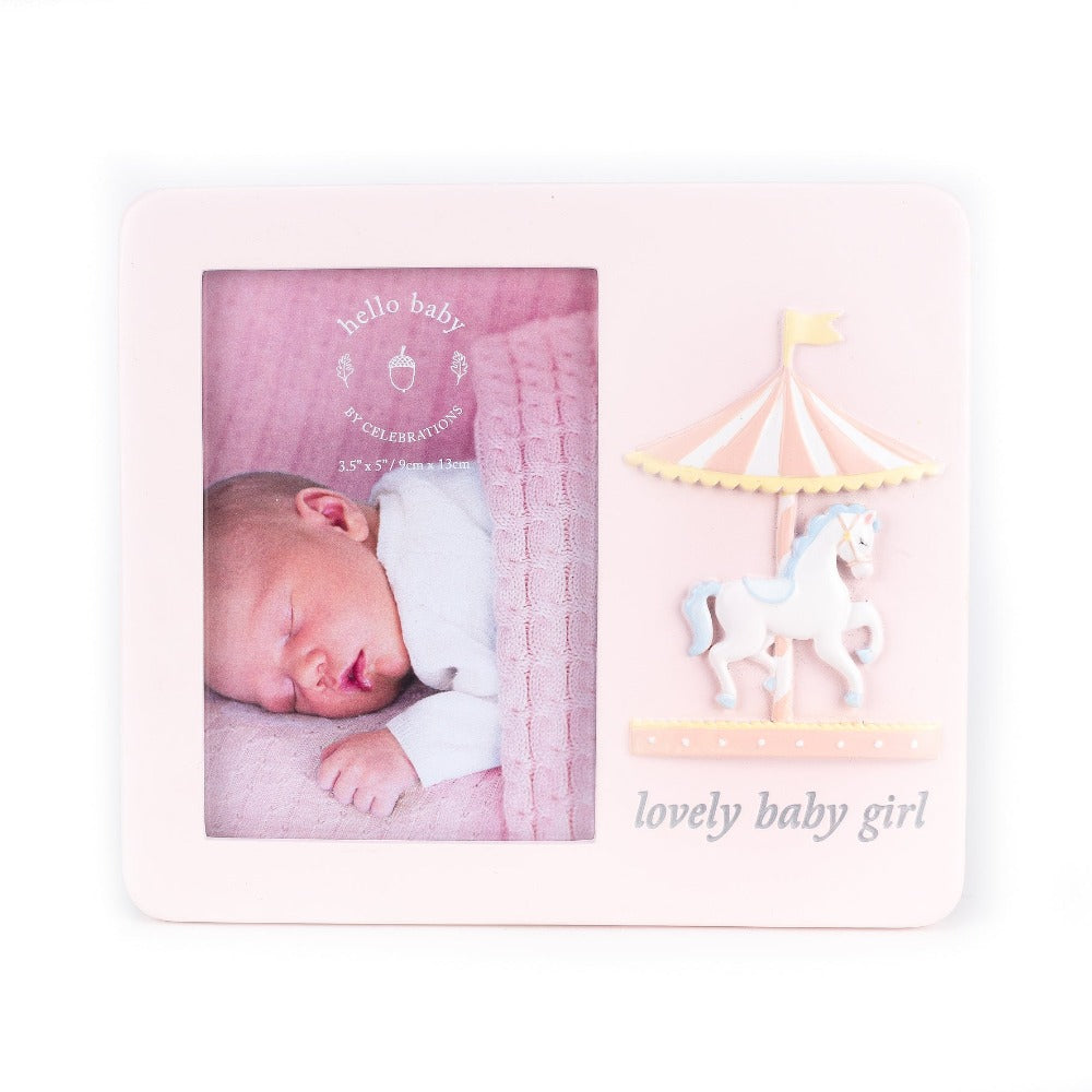 Hello Baby Frame Carousel Design 'Baby Girl' 3.5" x 5"  Give a sweet photo pride of place with this adorable pink carousel design frame.  With space for a portrait 3.5" x 5" image and a 'lovely baby girl' sentiment, this accessory makes a great gift for expecting parents.
