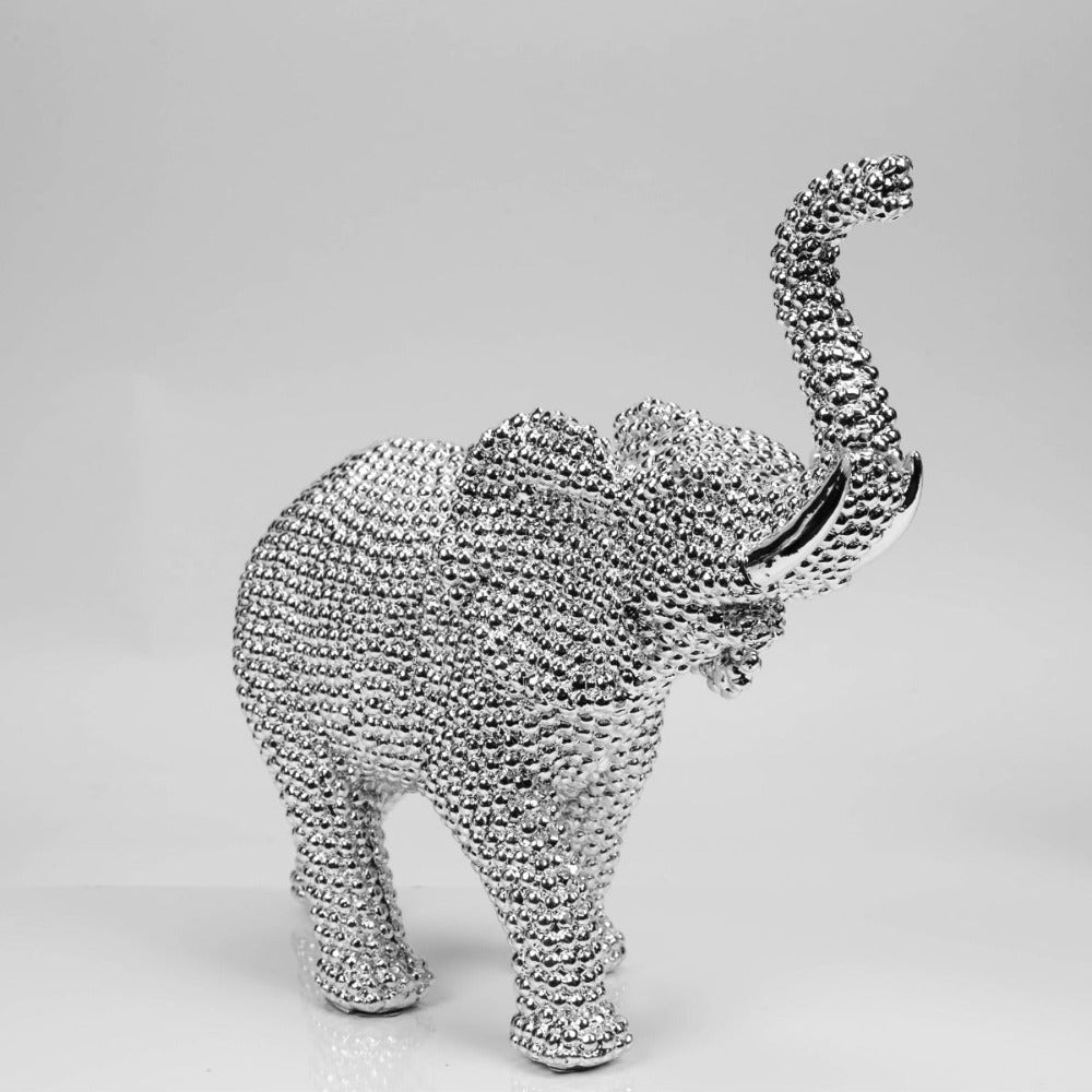 Hestia Diamante Elephant  Bring an elegant touch of glamour to any space with this glittering silver diamante effect elephant figurine. From the HESTIA® Silver Luxe collection - unparalleled glamour, style and elegance in contemporary home and gift.