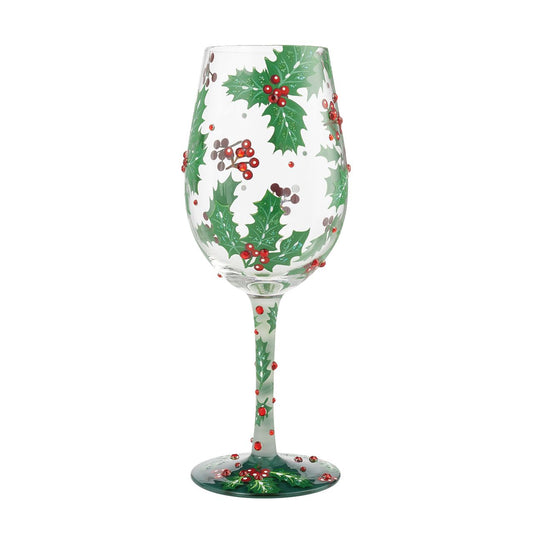 Holly Jolly Wine Glass by Lolita  Cheers to a cosy winter season our Holly Jolly Wine Glass features hand painted green holly leaves with red berries and red stones for those special occasions. With a traditional Christmas design this is a show stopper in itself.
