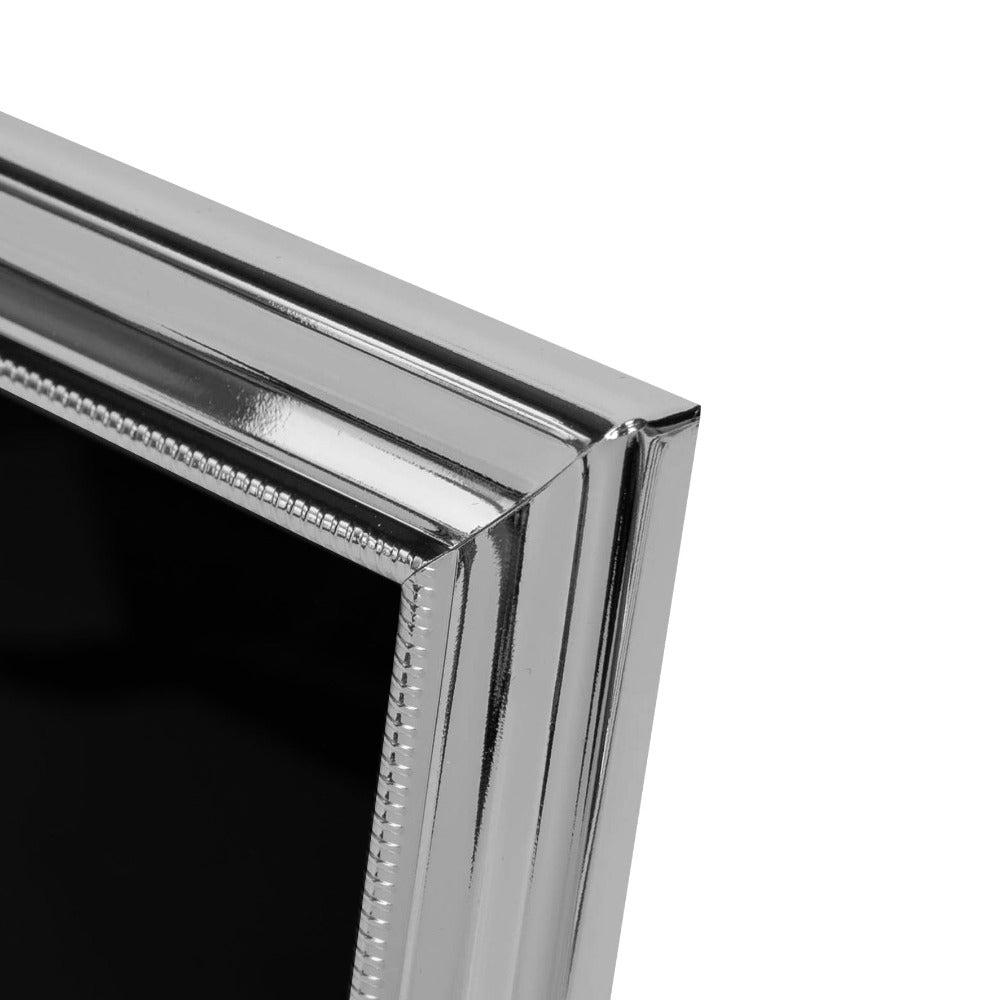 IMPRESSIONS Silver-plated Frame with Beaded Edge 8" x 10"  An elegant silver plated photo frame with scalloped edge and beaded aperture border. From IMPRESSIONS® - let your photos speak their thousands words.