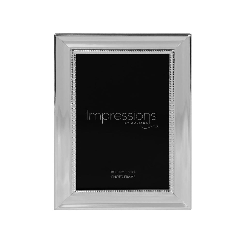 Impressions Silver Plated Photo Frame Beaded Edge 4" x 6"  An elegant silver plated photo frame with scalloped edge and beaded aperture border. From IMPRESSIONS® - let your photos speak their thousands words.
