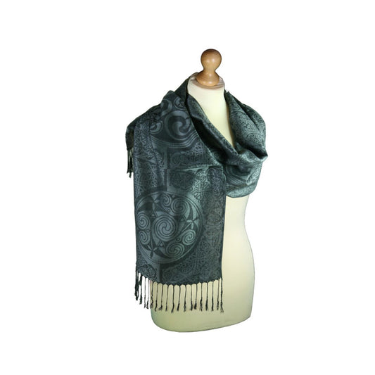 Mulligans Ireland Inishmore Celtic Pashmina Scarf  Inishmore (Árainn) is the largest of the Galway Aran Islands and is an extension of the famous limestone rocks of The Burren. The landscape of Inishmore is a patchwork of fields hemmed in by precariously balanced dry stone walls.