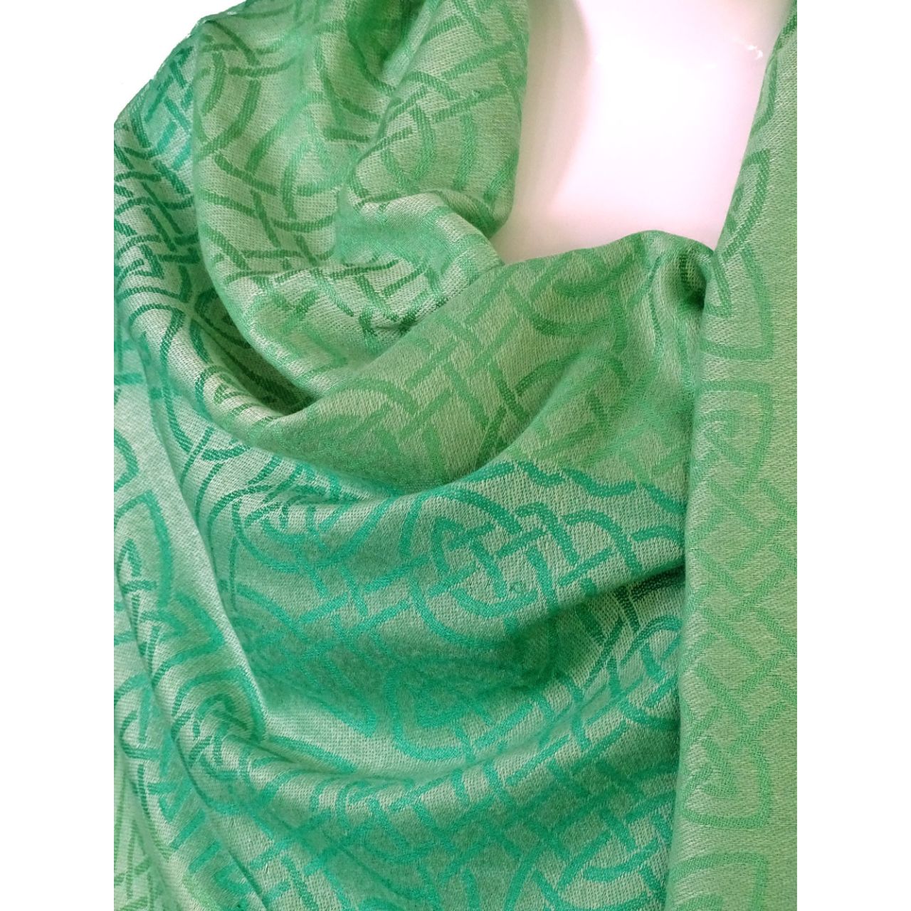 Mulligans Ireland Innisfree Celtic Pashmina Shawl  Named after the islands of Ireland, and inspired by their stories and history, our Island Range of shawls and scarves is a fusion of modern Irish design and colour palette together with the traditional Celtic knot weave or ‘snaidhm celtic’ in Irish/Gaelic.
