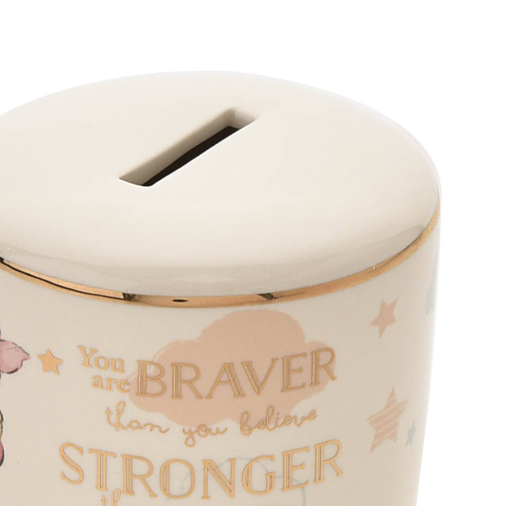 Disney Magical Beginnings Ceramic Money Box Bank - Winnie the Pooh  Evoke the magic of Disney with this Winnie The Pooh money bank.  As part of our Disney Magical Beginnings range, this beautiful money bank features an original sketch of Winnie the Pooh and Piglet, with the sentiment 'You are braver than you believe, stronger than you seem and smarter than you think' in gold foil lettering.