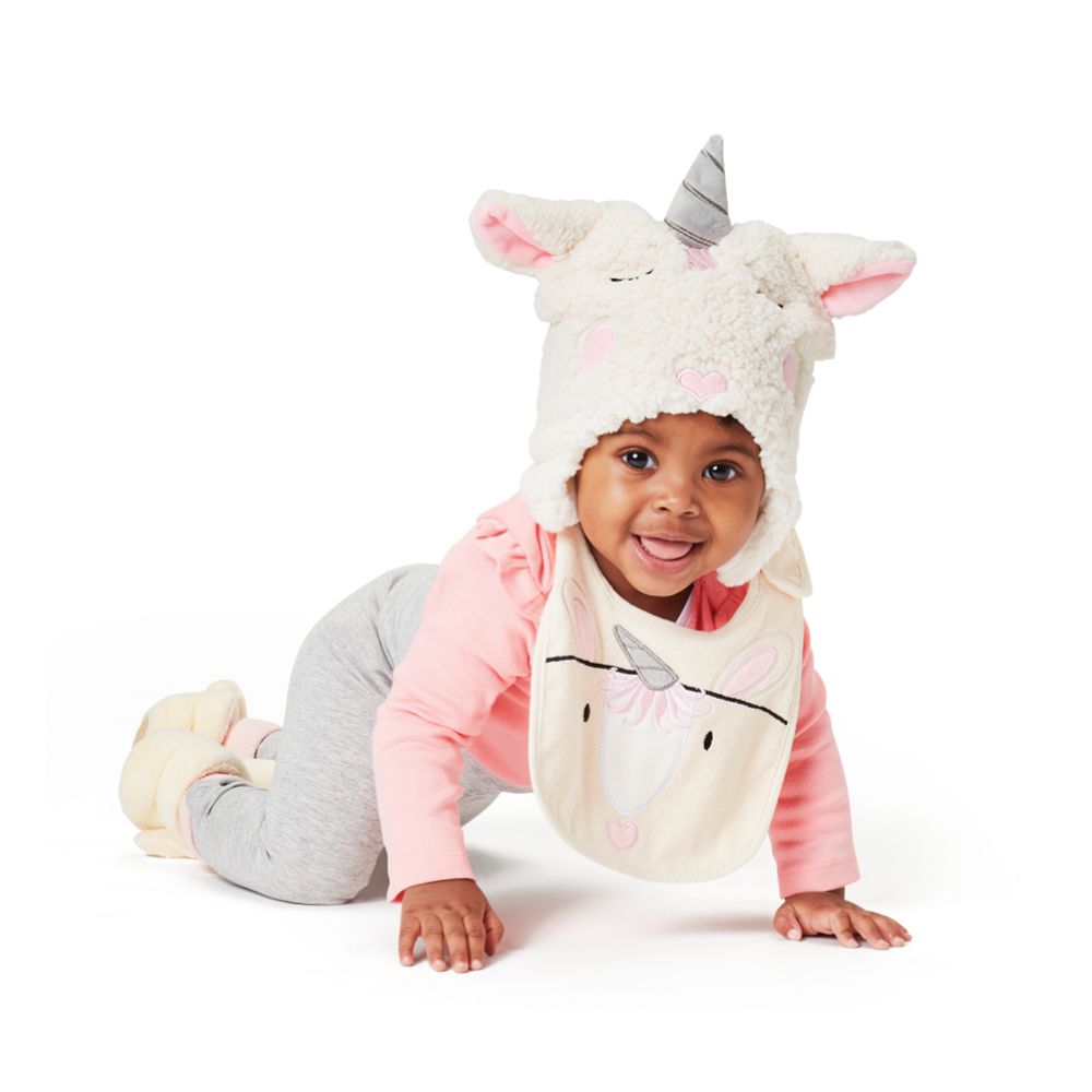 Izzy and Oliver Baby Collection Unicorn Baby Bib  This super soft and super cute Unicorn bib is perfect for little ones. Featuring a sweet Unicorn face that is embroidered for safety, Velcro fastening for easy wear and made from 100% cotton, it can be machine washed. This is part of the Izzy and Oliver Baby collection.