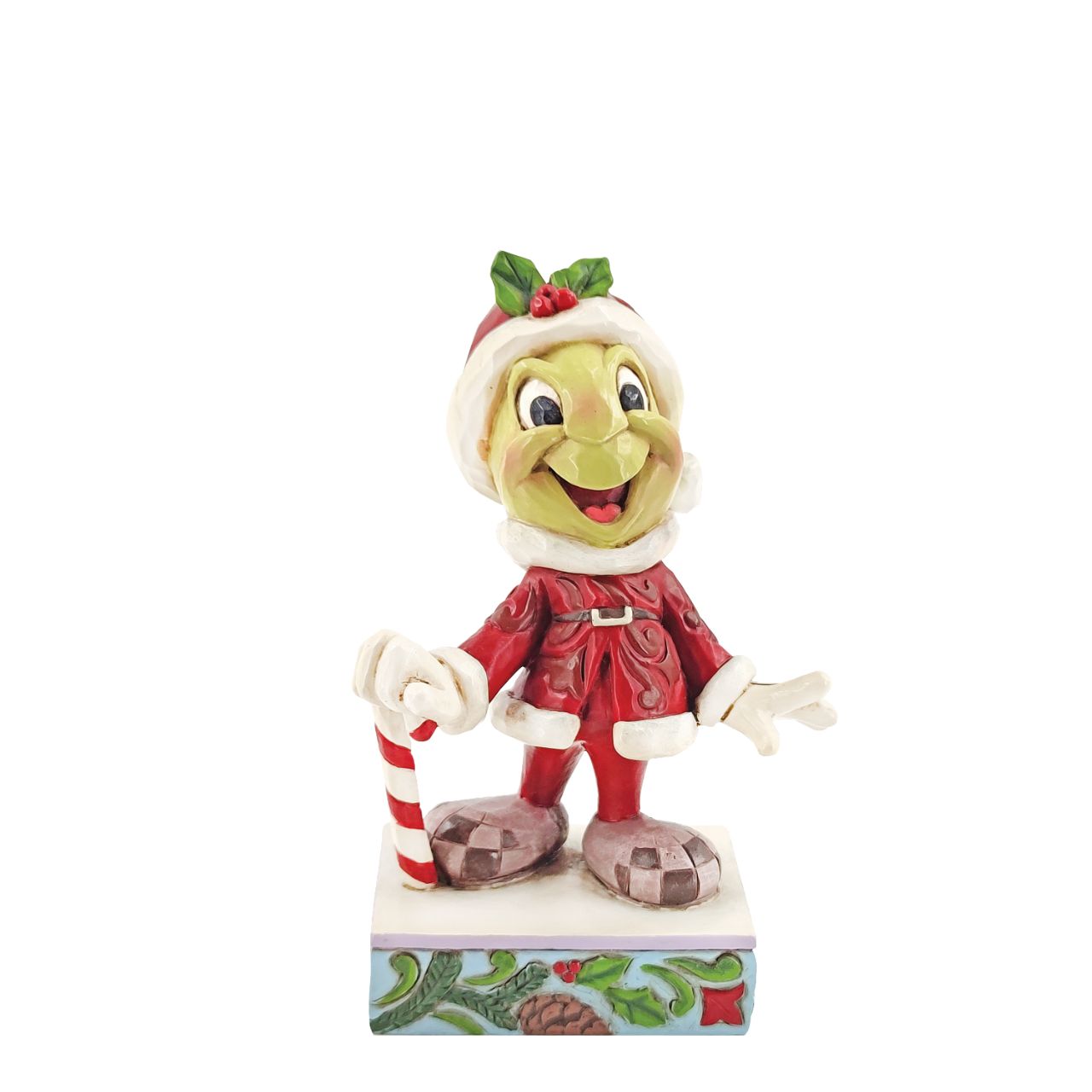 Jim Shore Disney Traditions Christmas Jiminy Cricket Figurine  Be Wise and Be Merry  This year, Jiminy Cricket lets Christmas be his guide. Donning Santa's coat and boots the charming little insect hopes to turn all your wishes true this season. Walking with a candy cane, the cricket smiles brightly in this Jim Shore classic.