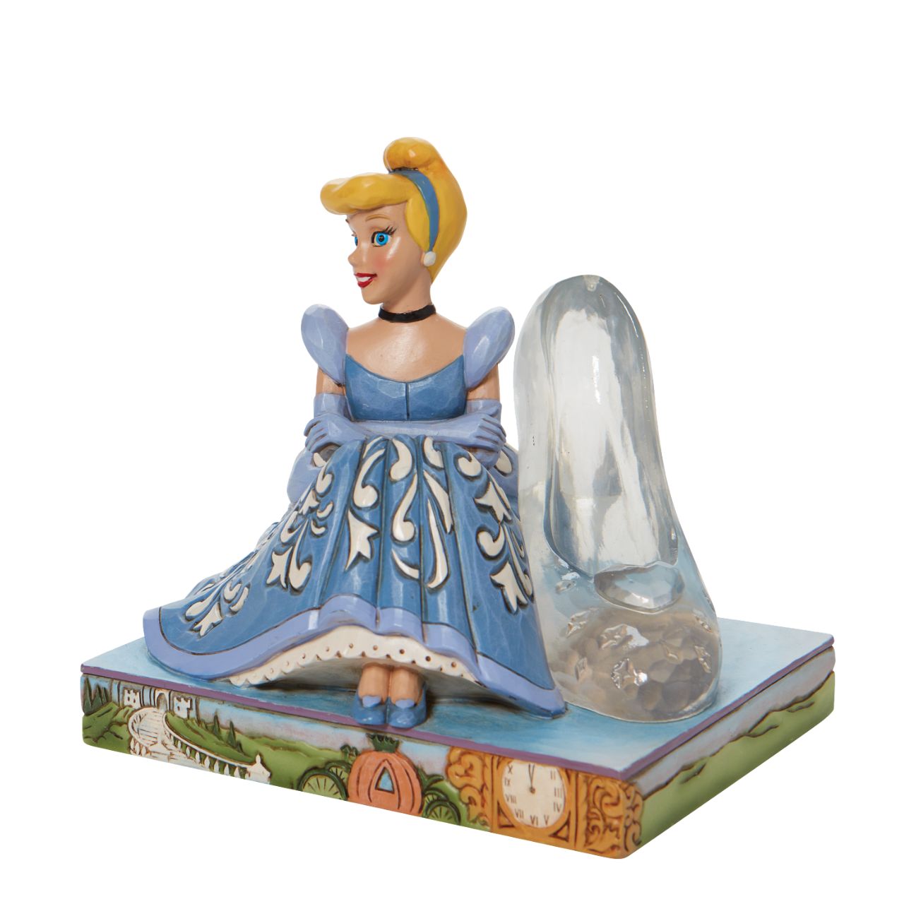Jim Shore Disney Cinderella Glass Slipper Figurine  This Disney Traditions line by Jim Shore features iconic Walt Disney princesses with their famous props highlighted. With a base illustrating her story, this piece features Cinderella in her brilliant blue gown with a glass slipper.