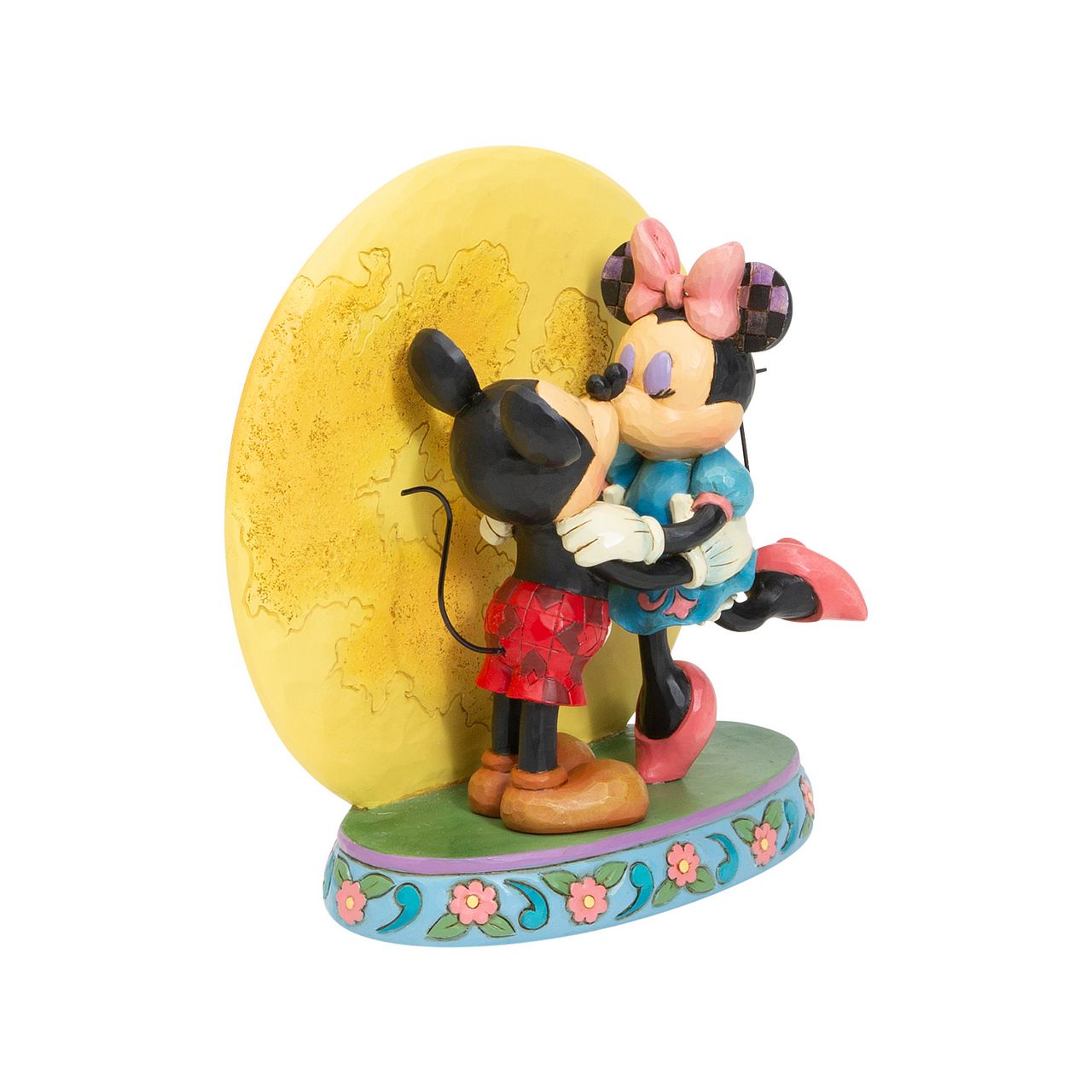 Jim Shore Magic and Moonlight Mickey and Minnie with Moon Figurine  This delightful figurine portrays Mickey & his sweetheart Minnie dancing in the moonlight. This refreshing piece celebrates springtime romance and is sure to be a hit with collectors.