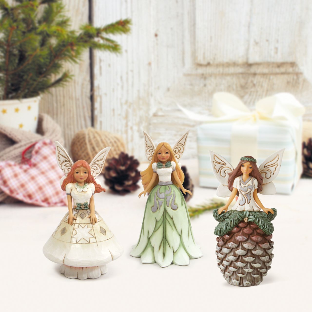 Jim Shore White Woodland Fairy with Leaf Skirt Figurine  Always believe and if not then at the very least enjoy the whimsical beauty of fairy's. This new collection of whimsical woodland fairies brings some magic to the White Woodland Collection and is sure to be a collectors favourite.