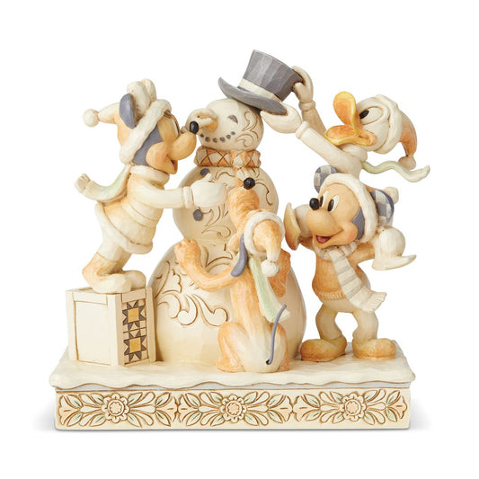 Jim Shore Heartwood Creek Frosty Friendship (White Woodland Mickey and Friends)  White Woodland Mickey and Friends joyfully build a snowman together. Peaceful soft White Woodland colour palette is suitable for any home décor style. White Woodland Fab 4. Unique variations should be expected as this product is hand painted. 