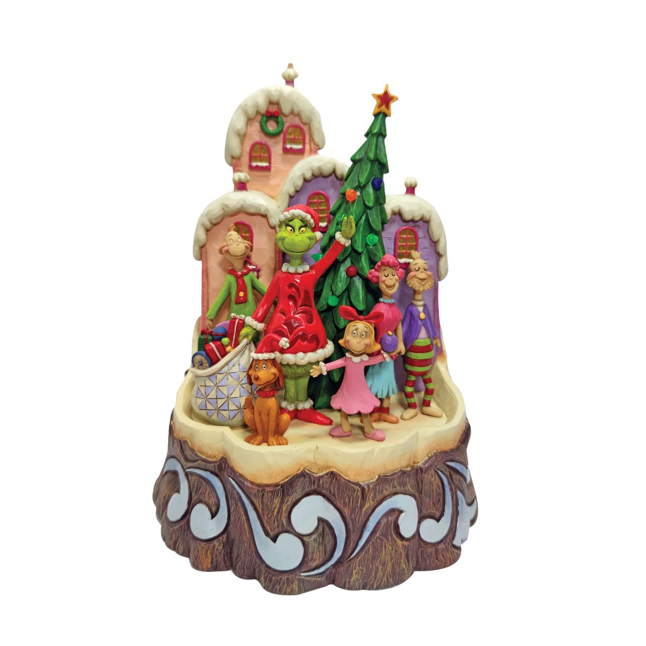 Jim Shore Dr. Seuss Grinch Carved by Heart Figurine  With an honest smile, the Grinch, by Jim Shore, has realized the true meaning of Christmas and for once, feels love in his heart. Together with Max and the residents of Whoville, Grinch waves solemnly with Cindy Lou Who in the decorated town.