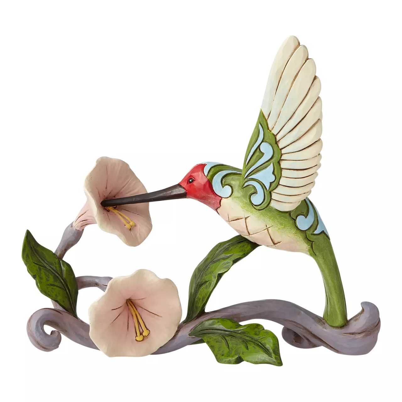 Jim Shore Heartwood Creek Blossoms and Beauty - Hummingbird with Flower  A colourful accent to brighten your day, Jim Shore's richly detailed Hummingbird design features a combination of subtle quilt patterning and beautifully hand-crafted rosemaling motifs. Each Heartwood Creek piece is hand painted, crafted using high quality cast stone. Comes in a branded Kraft gift box.