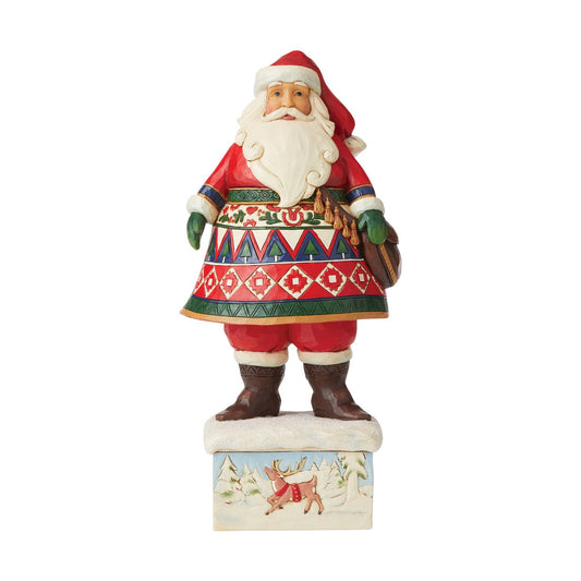 Jim Shore Heartwood Creek Feeling Festive In The Frost  13th Annual Lapland Santa  Wearing a splendidly patterned cloak, Santa grabs his satchel for a journey through the forest. Feeling festive, he goes for a walk in the frost to recruit reindeer for Christmas. 