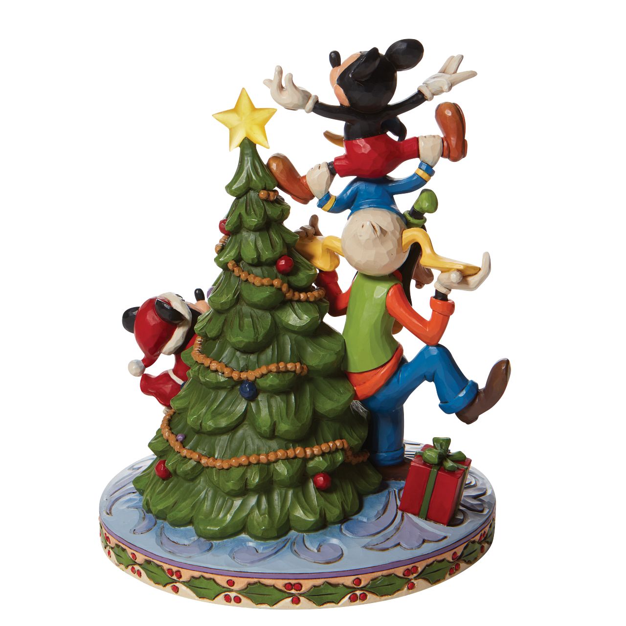 Jim Shore Merry Tree Trimming - Fab 5 Decorating Tree with illuminated  Mickey Mouse gets a hand and a boost decorating the tree this year. His friends form a teetering tower to hoist him to the top of the Mouse family tree while Minnie adds the finishing touches below in this Disney by Jim Shore design. 