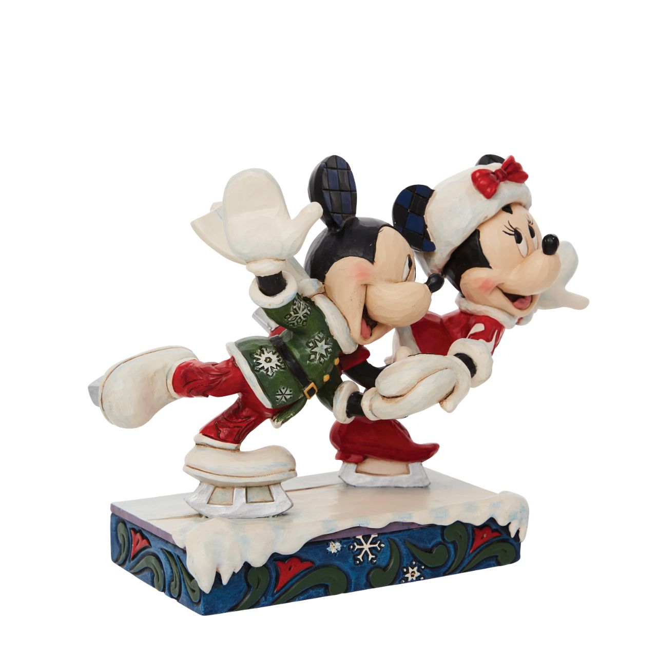 Jim Shore Mickey and Minnie Ice Skating Figurine  Skating together, Mickey and Minnie Mouse warm the winter with their timeless love story. Hand in hand the pair enjoy each other's company in stunning snowflake tunics in this Jim Shore creation.