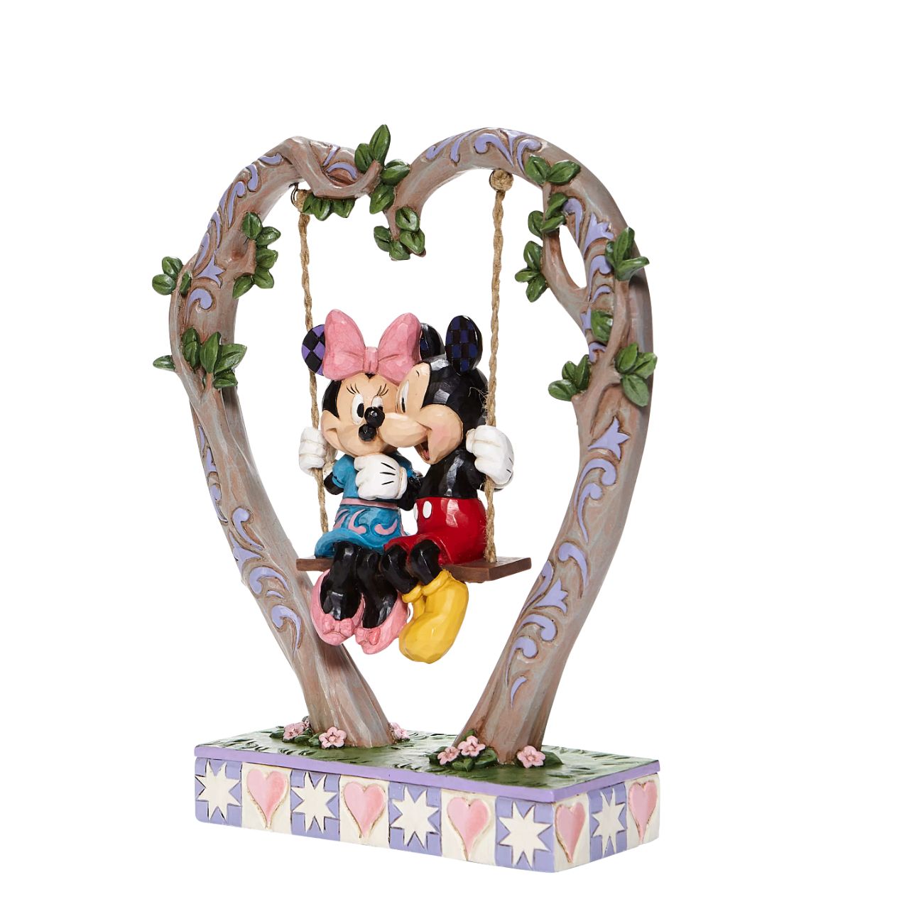 Jim Shore Sweethearts in Swing - Mickey and Minnie on Swing Figurine  Suspended from a heart-shaped branch, a smitten Mickey and Minnie swing into Spring in this quintessentially romantic Jim Shore sculpture.