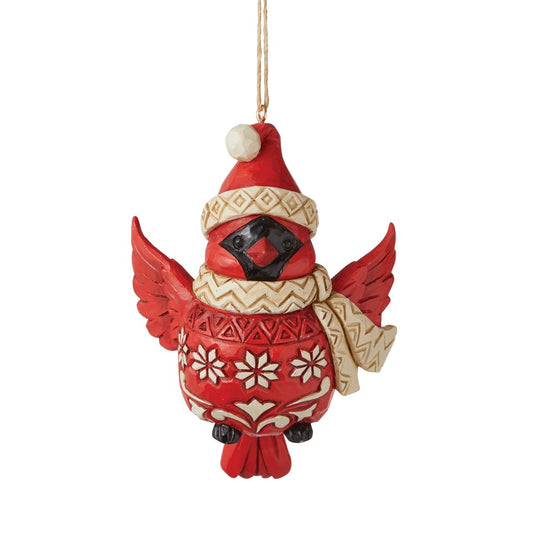 Nordic Noel Cardinal Christmas Hanging Ornament  Tweet your heart out alongside this cheery cardinal ornament. Wearing a patterned Santa hat and matching scarf, this charismatic cutie seems to flutter between your tree's branches with holiday excitement. With folksy patterned plumage, he soars.
